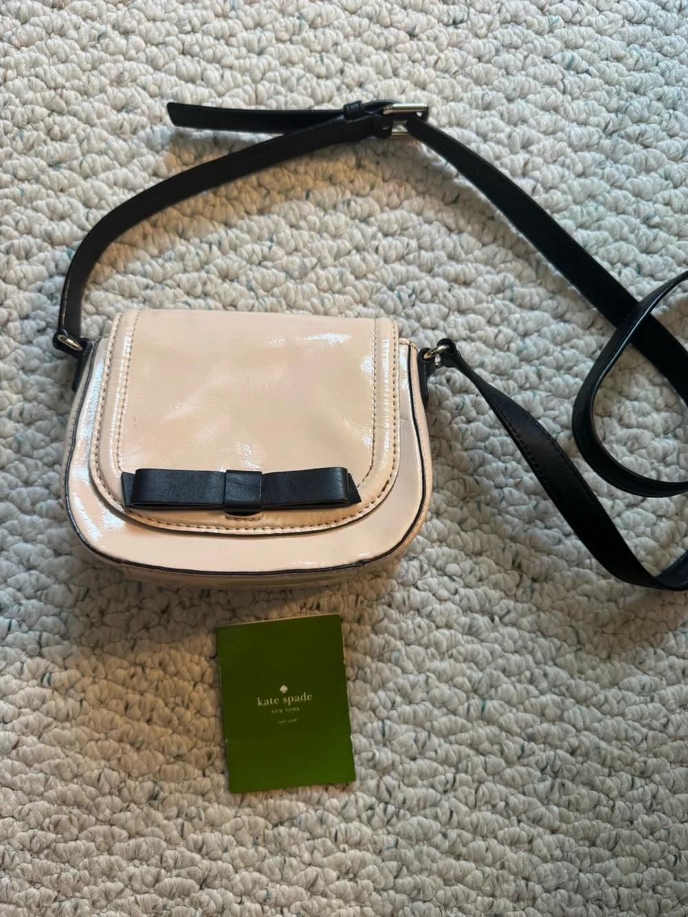 kate spade Cream Crossbody Bag with Black Strap and Bow
